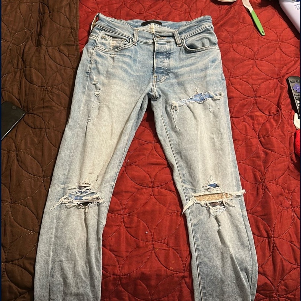 Distressed Light Blue Jeans